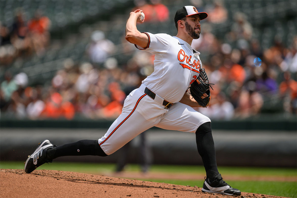 Jul 31, 2024; Baltimore, Maryland, USA; Baltimore Orioles pitcher Grayson Rodriguez (30) throws against the Toronto Blue Jays during the first inning at Oriole Park at Camden Yards. 