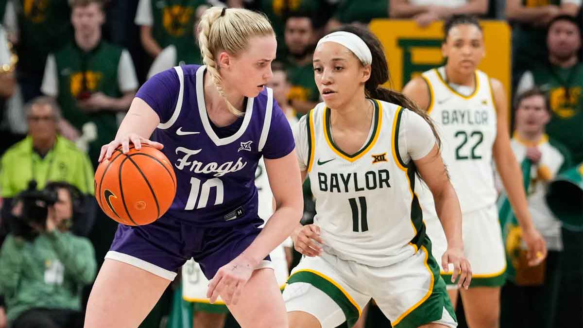 TCU Horned Frogs guard Hailey Van Lith (10) controls the ball as Baylor Lady Bears guard Jada Walker (11) defends during the second half at Paul and Alejandra Foster Pavilion.