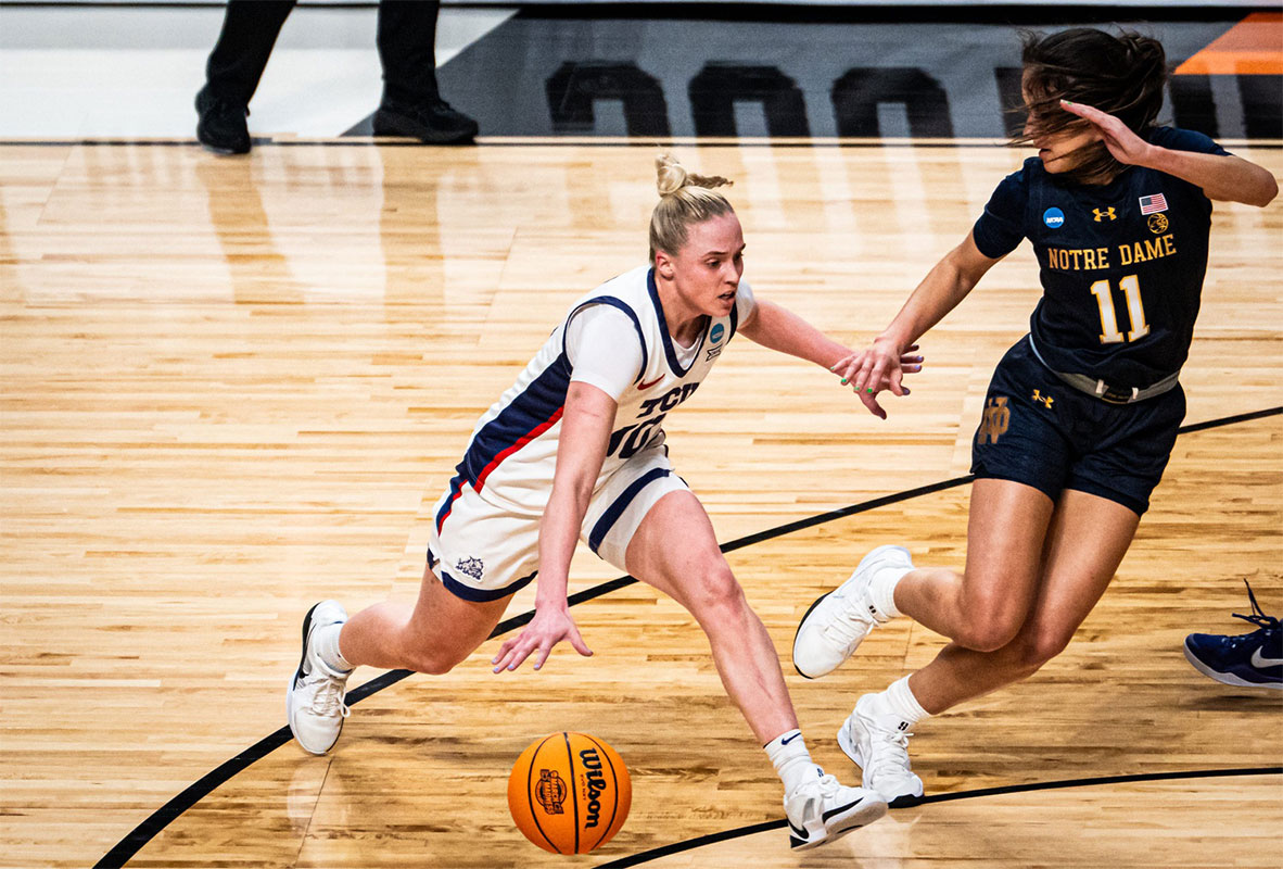 TCU Horned Frogs guard Hailey Van Lith (10) looks to get around defense from Notre Dame Fighting Irish guard Sonia Citron (11) during the first half of the Horned Frogs' NCAA Playoff Regional semi-final game at Legacy Arena