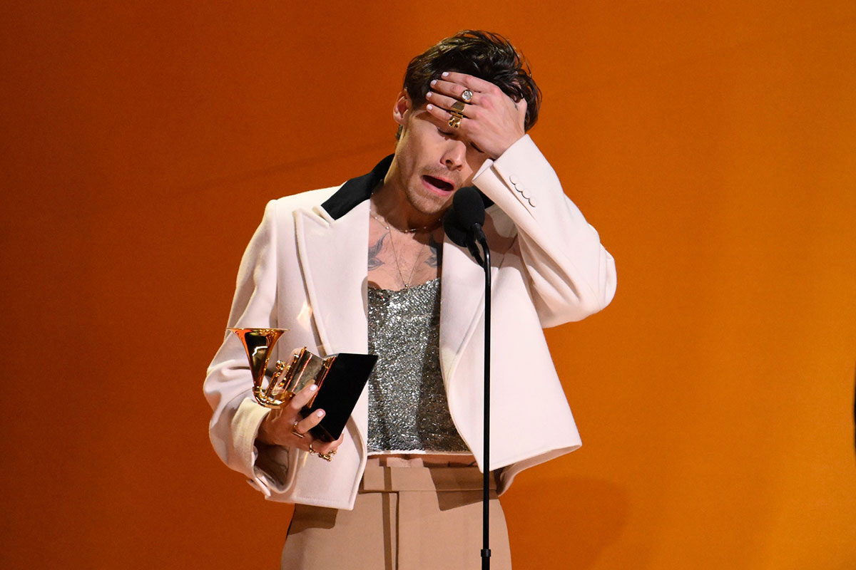 Harry Styles accepting a Grammy Award for Harry's House in 2023.