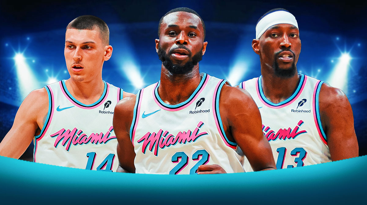Miami Heat star Andrew Wiggins in the middle of Tyler Herro and Bam Adebayo in front of Kaseya Center.