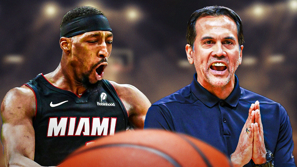 Miami Heat star Bam Adebayo looking hyped next to Erik Spoelstra in front of Kaseya Center.