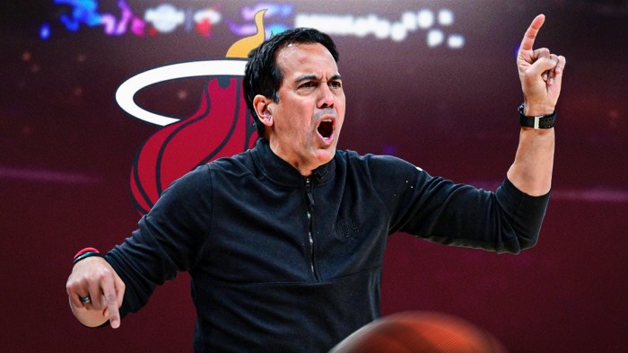 Erik Spoelstra looking angry. Heat logo in the background.
