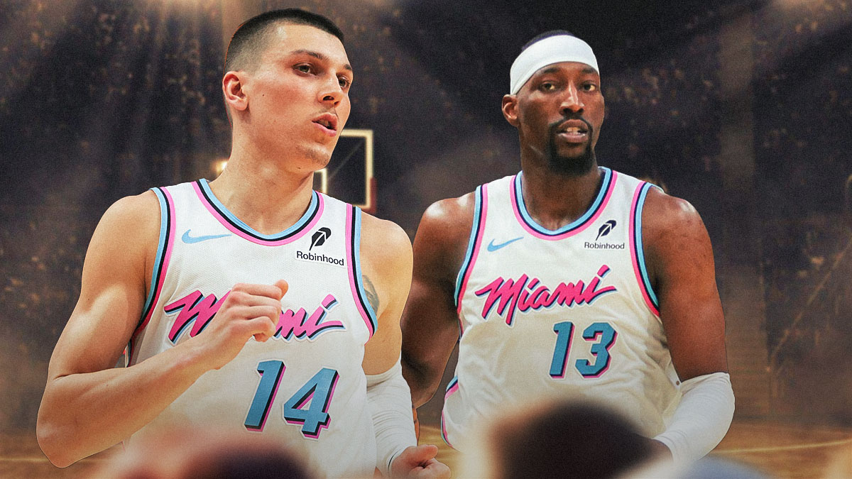 Miami Heat stars Tyler Herro and Bam Adebayo in front of Kaseya Center.