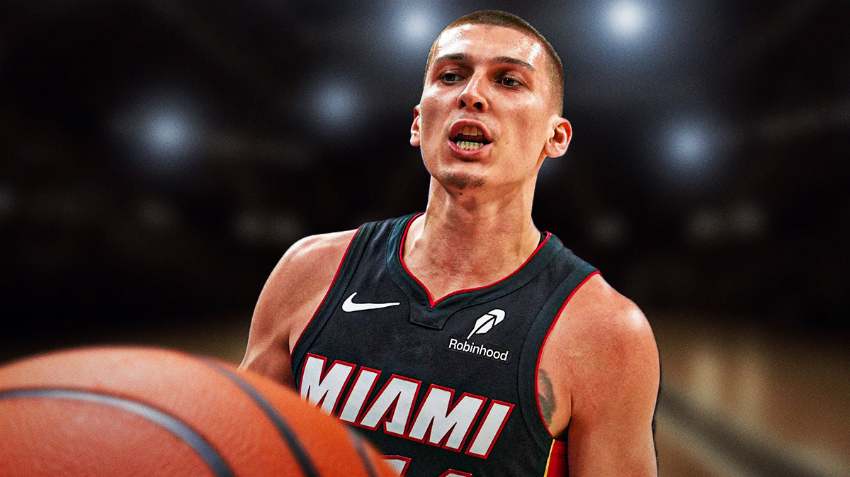 Miami Heat star Tyler Herro in front of Kaseya Center.