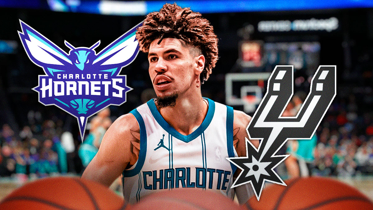 Hornets guard LaMelo Ball next to the Spurs logo with the Hornets logo in the background