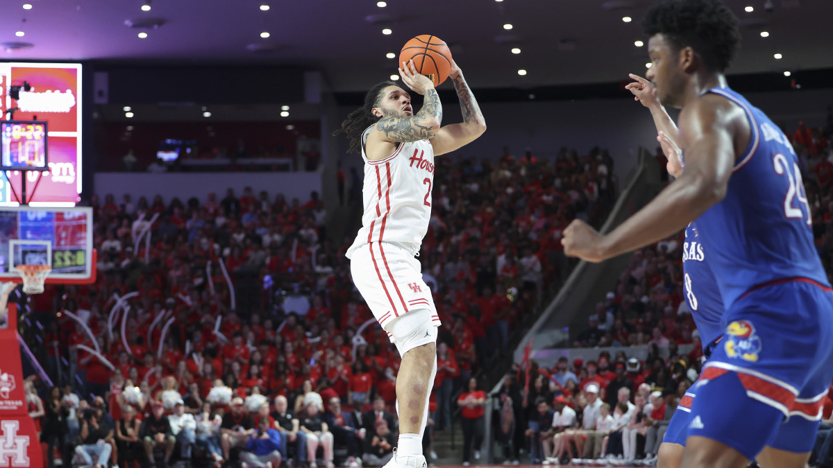 Houston Cougars guard Emanuel Sharp (21) shoots the ball during the second half against the Kansas Jayhawks at Fertitta Center.