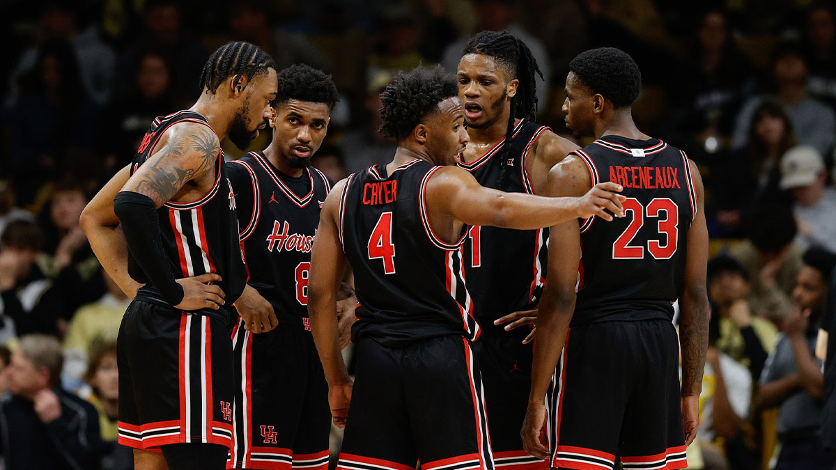 Houston Cougars guard L.J. Cryer (4) talks with forward Joseph Tugler (11) and guard Mylik Wilson (8) and forward J'Wan Roberts (13) and guard Terrance Arceneaux (23) in the second half against the Colorado Buffaloes at CU Events Center.