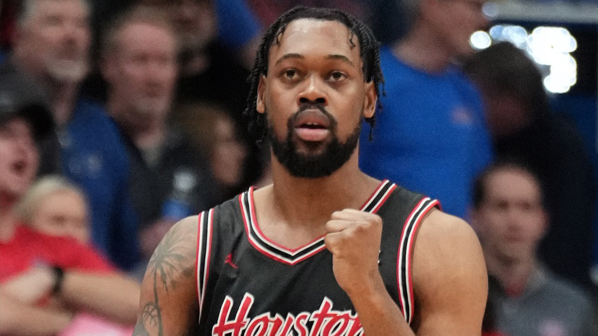 Houston Cougars forward J'Wan Roberts (13) celebrates after scoring against the Kansas Jayhawks during the second half at Allen Fieldhouse.