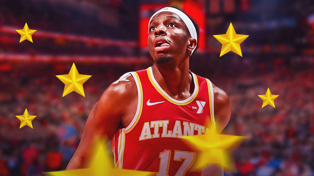 Onyeka Okongwu with stars around the picture.