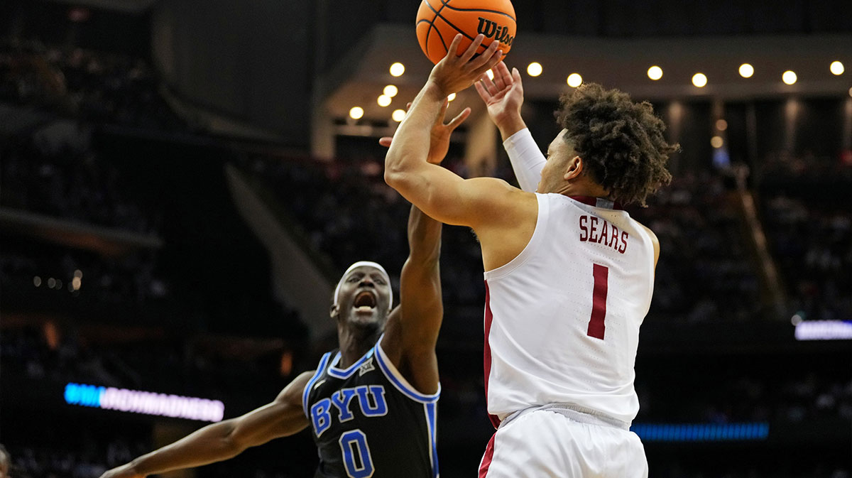 Alabama Crimson Tide guard Mark Sears (1) shoots the ball against Brigham Young Cougars forward Mawot Mag (0) during the first half during an East Regional semifinal of the 2025 NCAA tournament at Prudential Center.