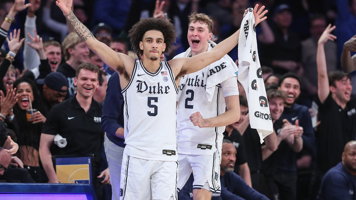  Duke Blue Devils guards Tyrese Proctor (5) and Cooper Flagg (2) celebrate from the bench in the second half against the Illinois Fighting Illini at Madison Square Garden. 