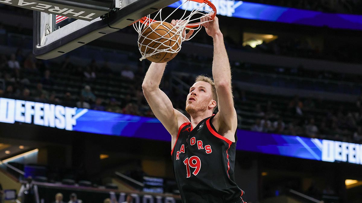 Toronto Raptors center Jakob Poeltl (19) dunks during the second half against the Orlando Magic at Kia Center.