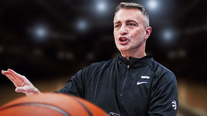 Toronto Raptors coach Darko Rajakovic with the Raptors arena in the background, tanking season