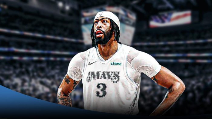 Dallas Mavericks player Anthony Davis with the Mavericks arena in the background injury