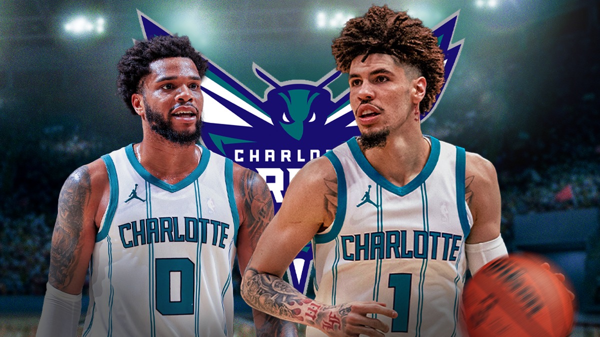 Charlotte Hornets players LaMelo Ball and Miles Bridges with the Hornets logo in the background