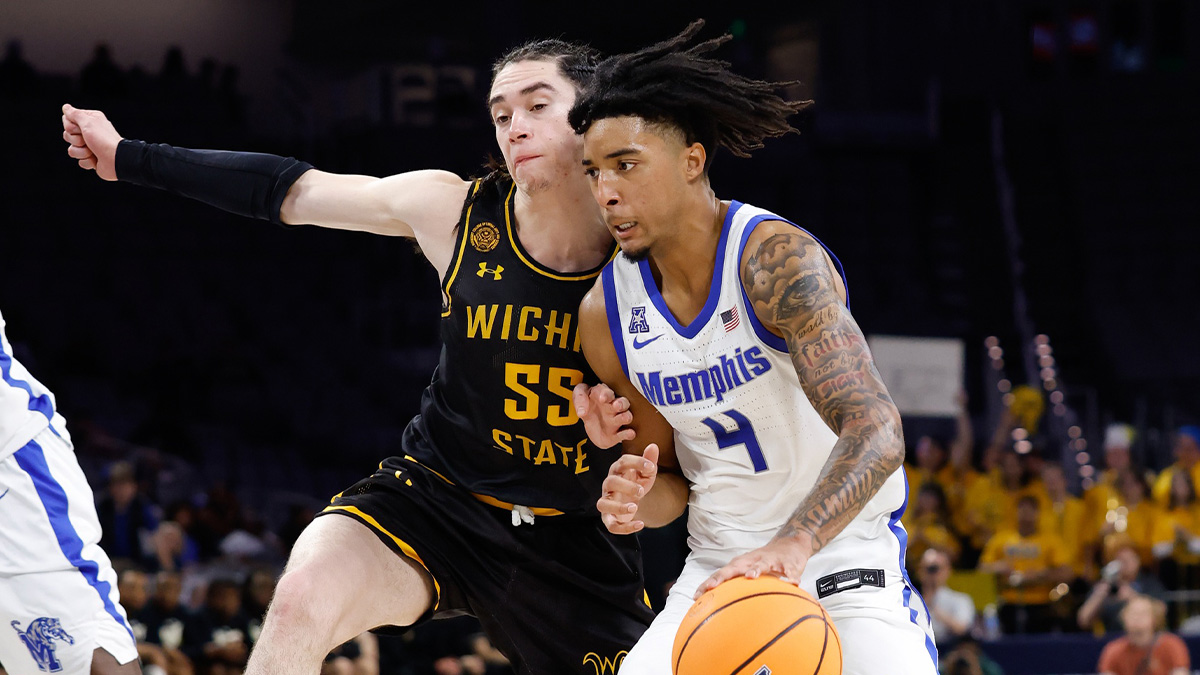 Memphis Tigers guard PJ Haggerty (4) drives to the basket as Wichita State Shockers guard Bijan Cortes (55) defends during the second half at Dickies Arena.