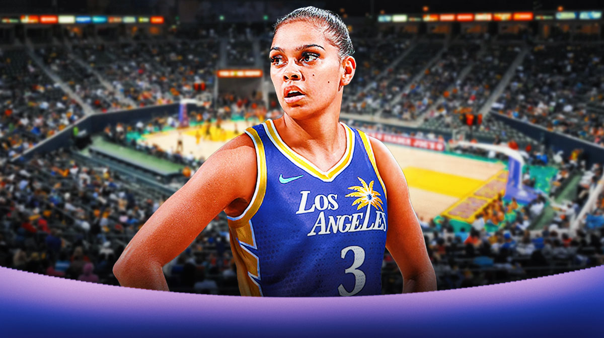 LA Sparks player Shaneice Swain with the LA Sparks arena in the background rookie season, roster cut move