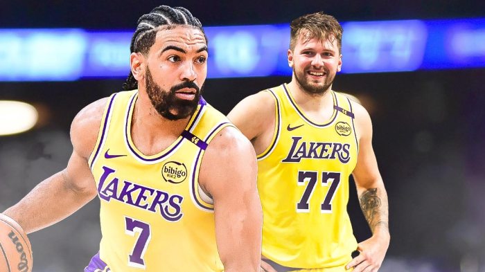 LA Lakers players Luka Doncic and Gabe Vincent with the Lakers arena in the background