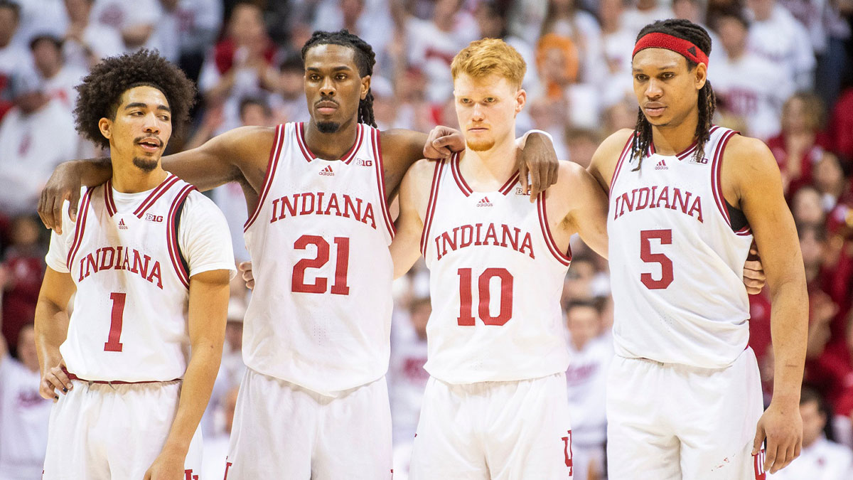 Indiana's Myles Rice (1), Mackenzie Mgbako (21), Luke Goode (10) and Malik Reneau (5) watch as Anthony Leal shoots a free throw during the Indiana versus Ohio State men's basketball game at Simon Skjodt Assembly Hall on Saturday, March 8, 2025.