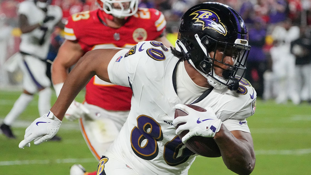 Baltimore Ravens tight end Isaiah Likely (80) runs the ball against the Kansas City Chiefs during the second half at GEHA Field at Arrowhead Stadium.