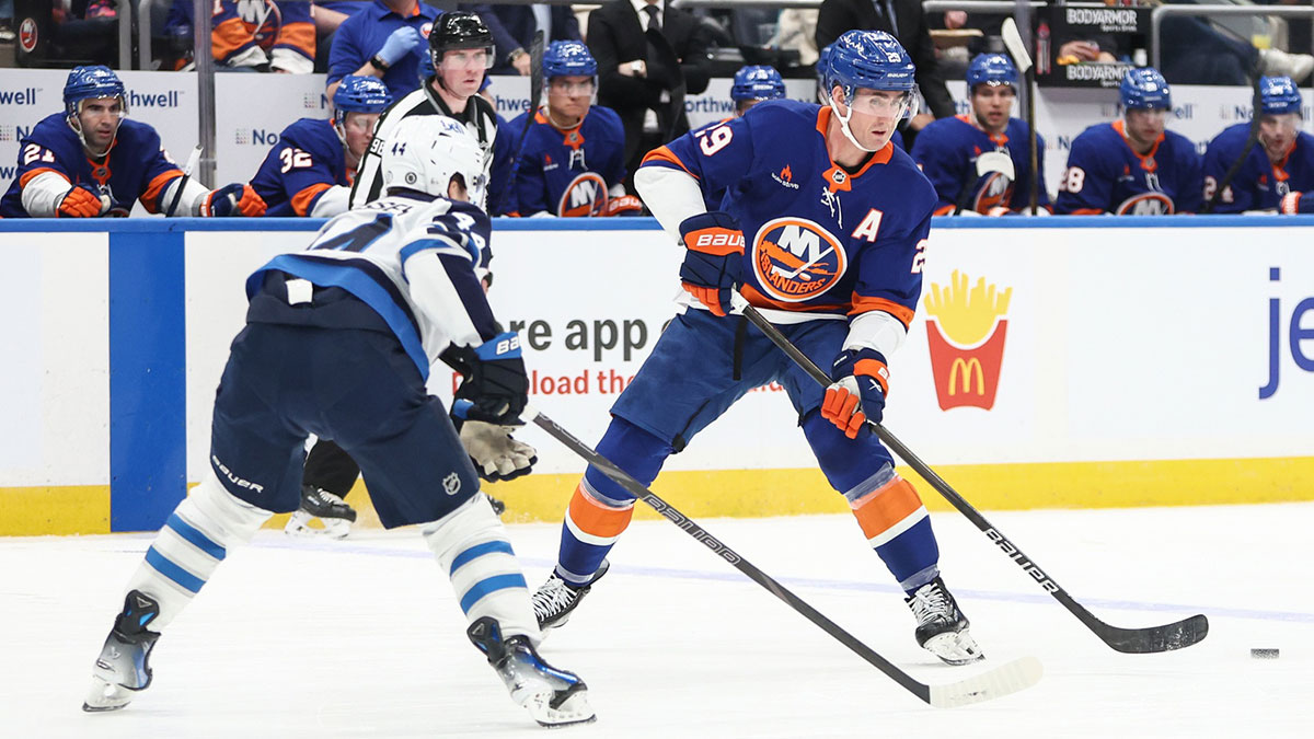 New York Islanders center Brock Nelson (29) passes the puck in the second period against the Winnipeg Jets at UBS Arena.