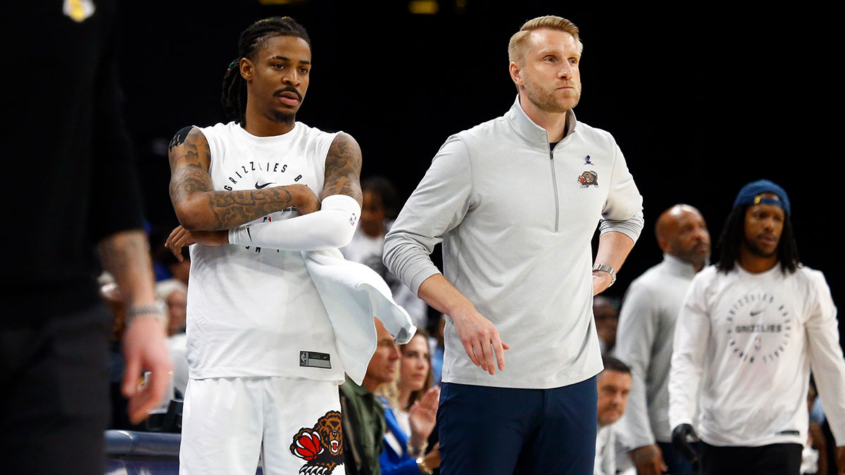 Memphis Grizzlies guard Ja Morant (left) and interim head coach Tuomas Iisalo (right) look on during the fourth quarter against the Los Angeles Lakers at FedExForum.