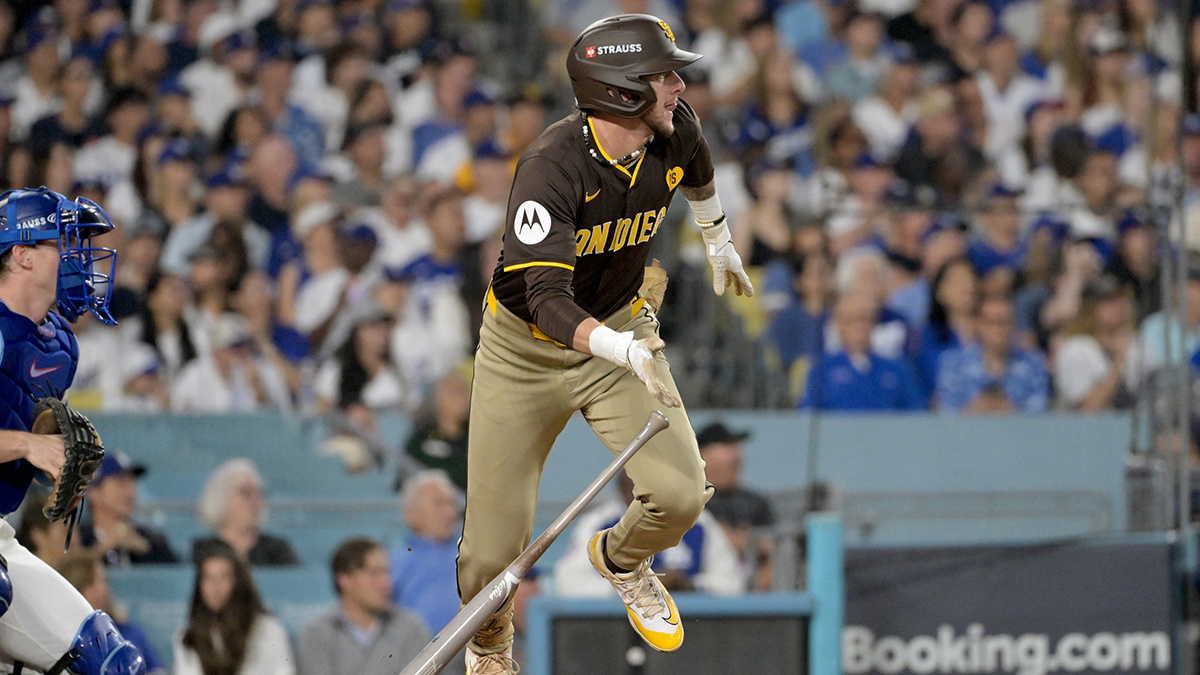 San Diego Padres outfielder Jackson Merrill (3) runs after hitting an RBI single against the Los Angeles Dodgers in the sixth inning during game two of the NLDS for the 2024 MLB Playoffs at Dodger Stadium.