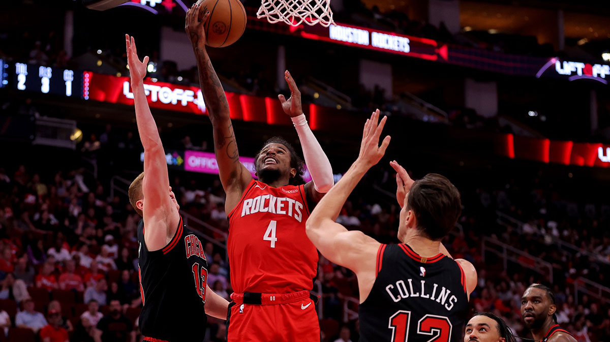 Houston Rockets guard Jalen Green (4) shoots a layup against the Chicago Bulls during the fourth quarter at Toyota Center.