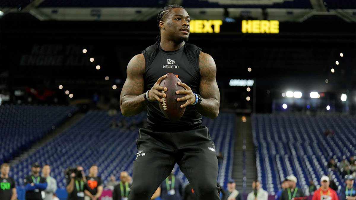 Mar 1, 2025; Indianapolis, IN, USA; Alabama quarterback Jalen Milroe (QB11) during the 2025 NFL Combine at Lucas Oil Stadium.