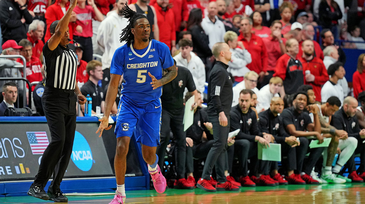 Creighton Bluejays guard Jamiya Neal (5) celerbates after making a three pointer during the first half against the Louisville Cardinals in the first round of the NCAA Tournament at Rupp Arena.