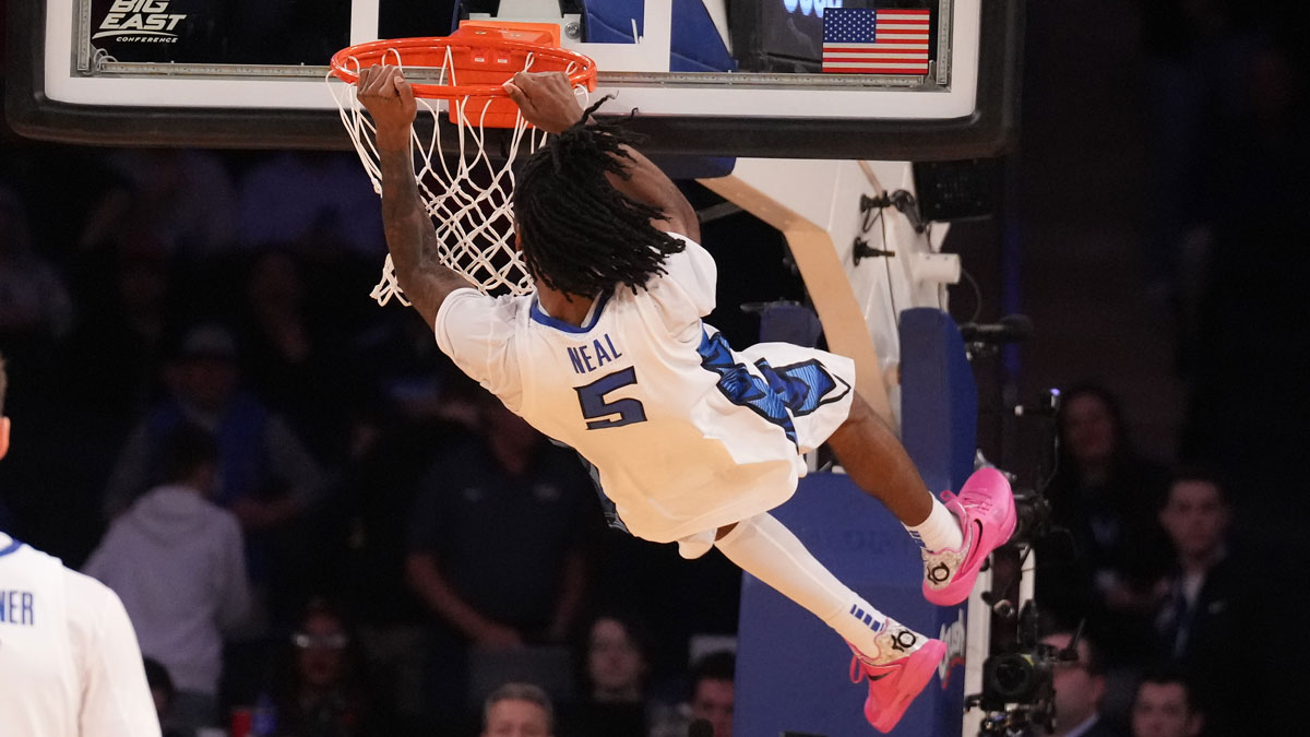 Creighton Bluejays guard Jamiya Neal (5) dunks on Connecticut Huskies as time ran out on the Huskies in the second half at Madison Square Garden in Big East Tournament.