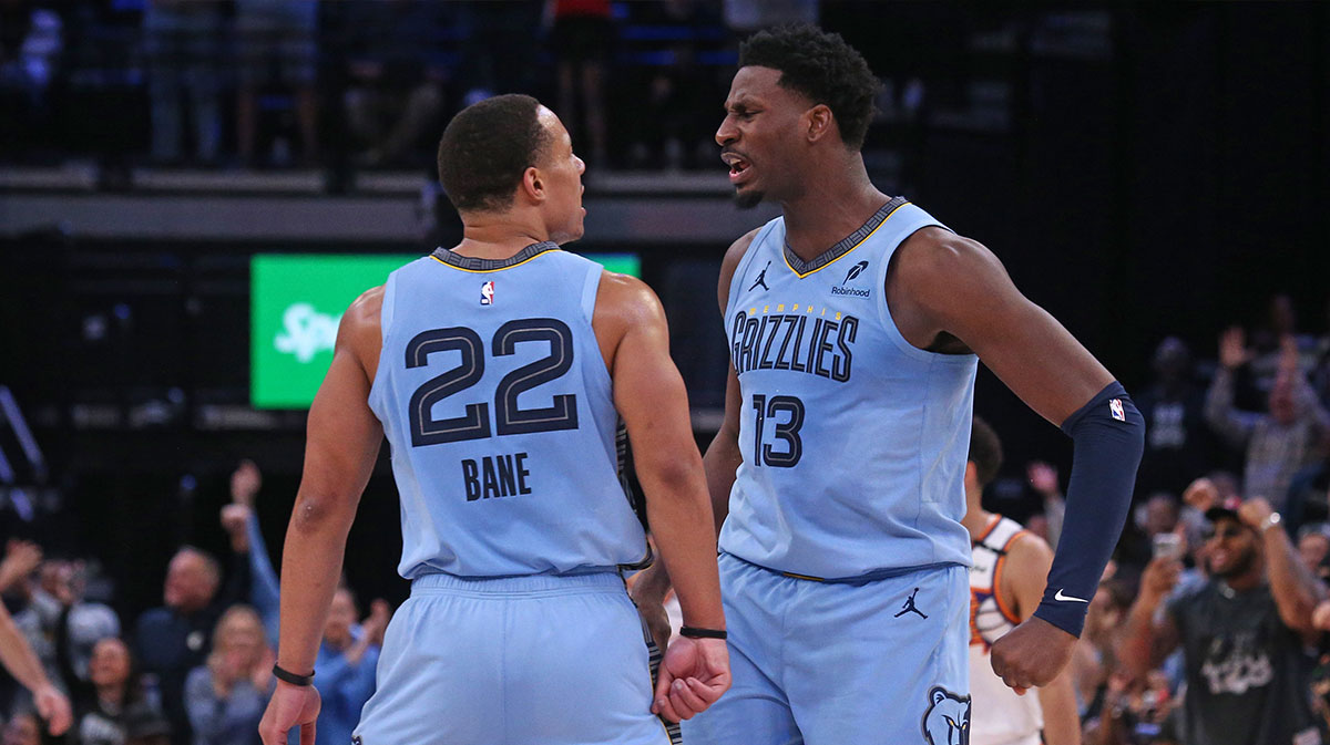 Memphis Grizzlies Next Jaren Jackson Jr. (13) Reacies with Memphis Grizzlies Guard Desmond Bane (22) during the third quarter against Phoenix Sun in FedExforum.