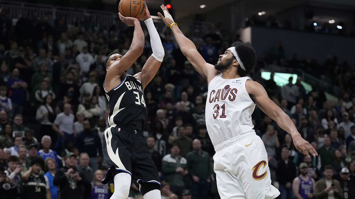 Milwaukee Bucks forward Giannis Antetokounmpo (34) puts up a shot against Cleveland Cavaliers center Jarrett Allen (31) in the second half at Fiserv Forum.