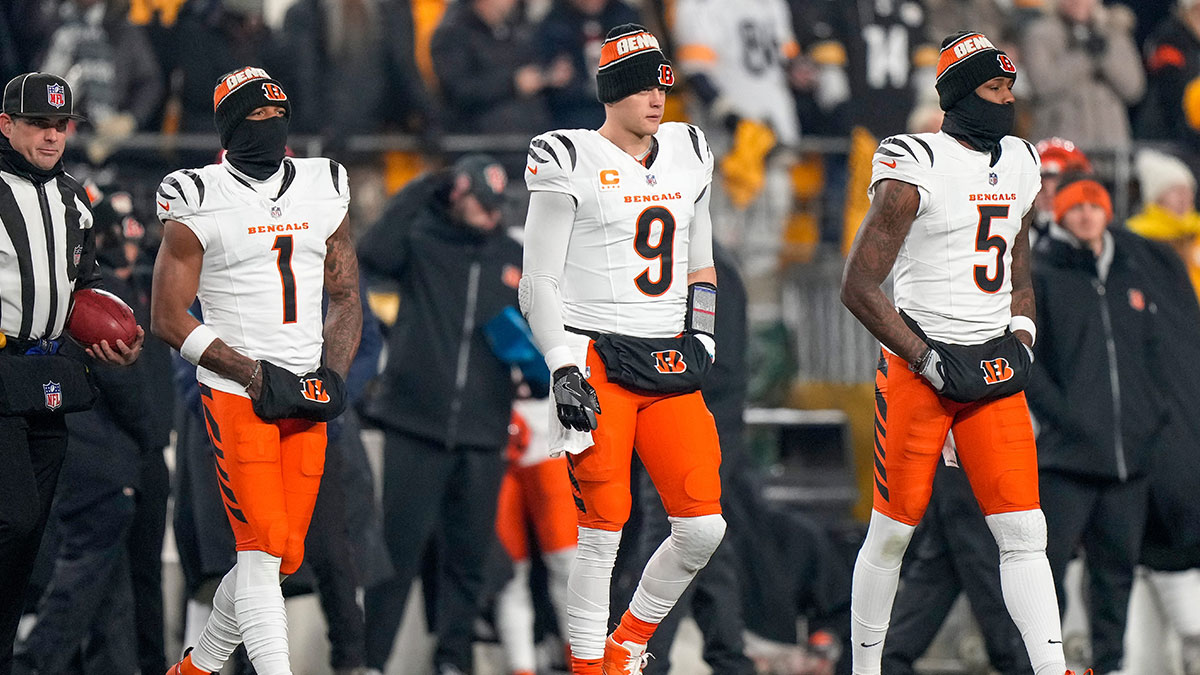 Cincinnati Bengals wide receiver Ja'Marr Chase (1), quarterback Joe Burrow (9) and wide receiver Tee Higgins (5) take the field as captains for the coin toss before the first quarter of the NFL Week 18 game between the Pittsburgh Steelers and the Cincinnati Bengals at Acrisure Stadium in Pittsburgh on Saturday, Jan. 4, 2025.