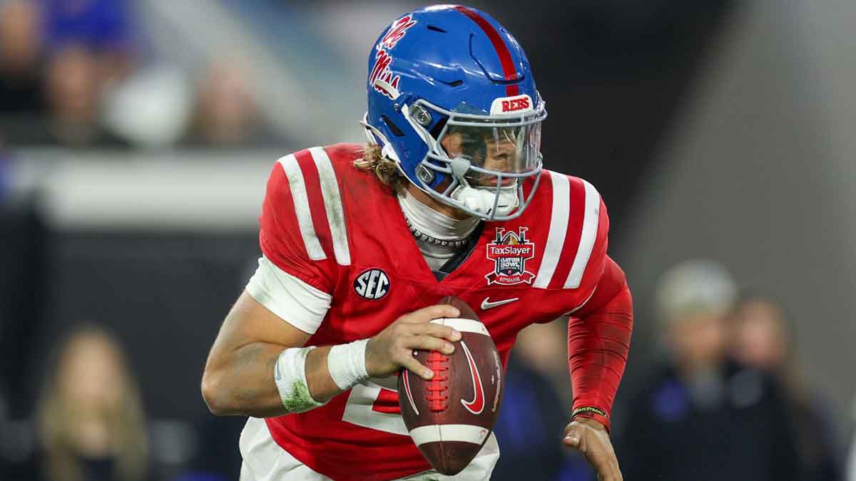 Mississippi Rebels quarterback Jaxson Dart (2) drops back to pass against the Duke Blue Devils in the second quarter during the Gator Bowl at EverBank Stadium