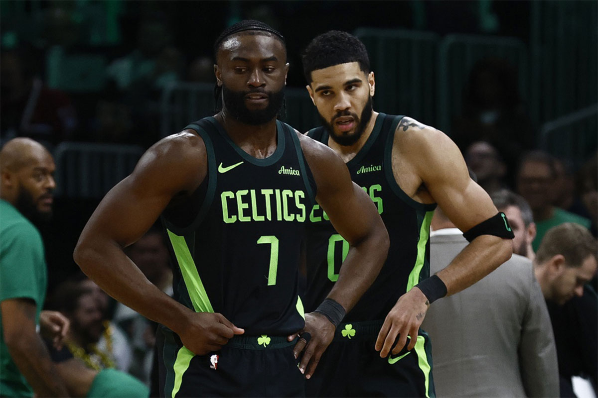 Boston Celtics guard Jaylen Brown (7) and forward Jayson Tatum (0) stand on the court during a timeout during the second half of their loss to the Cleveland Cavaliers at TD Garden.