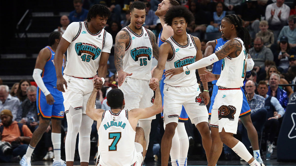 Memphis Grizzlies forward GG Jackson II (45), forward Brandon Clarke (15), forward Jaylen Wells (0) and guard Ja Morant (12) help forward Santi Aldama (7) during the second quarter against the Oklahoma City Thunder at FedExForum.