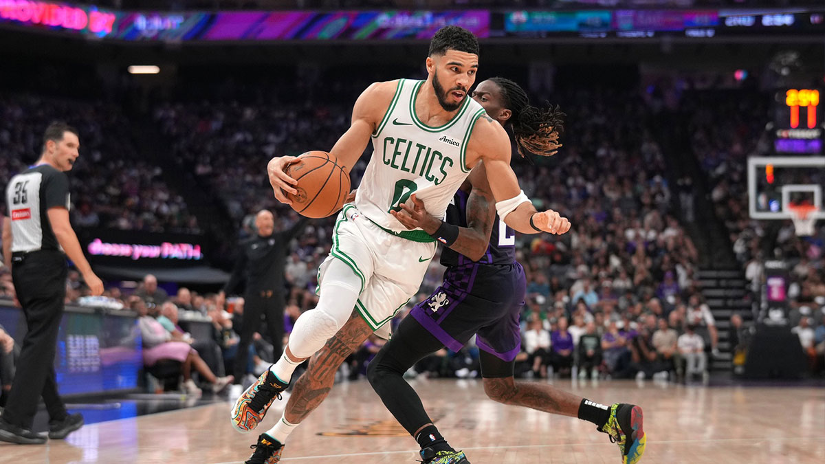Boston Celtics forward Jayson Tatum (0) spins past Sacramento Kings guard Keon Ellis (23) in the second quarter at the Golden 1 Center.