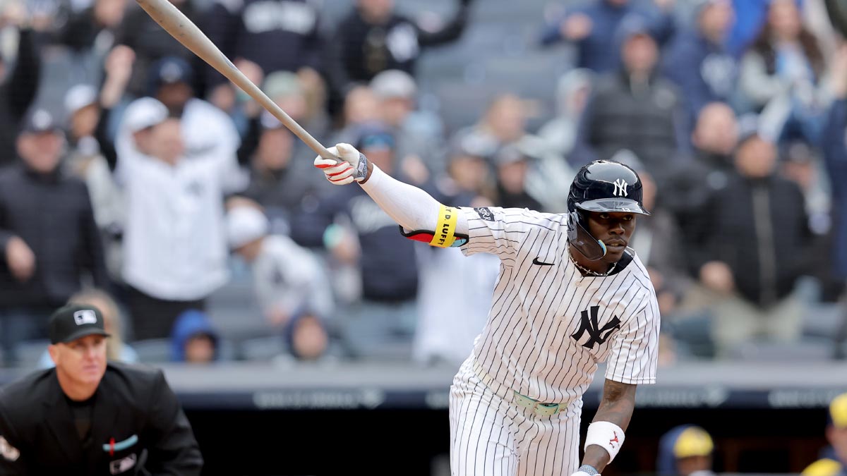 New York Yankees second baseman Jazz Chisholm Jr. (13) watches his three run home run against the Milwaukee Brewers during the seventh inning at Yankee Stadium.
