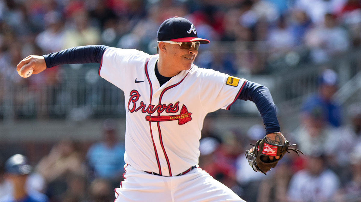 Atlanta Braves pitcher Jesse Chavez (60) pitches the ball against the Toronto Blue Jays during the ninth inning at Truist Park.