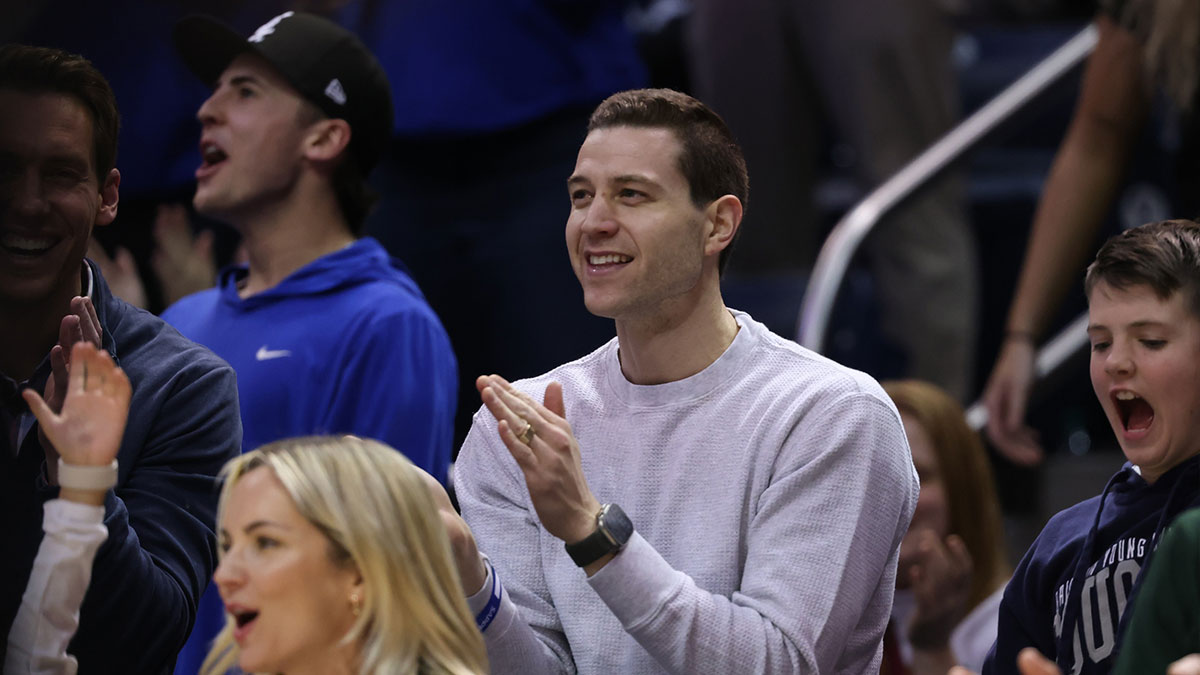 Former NBA and Brigham Young Cougars basketball player Jimmer Fredette watches the game against the Houston Cougars during the second half at Marriott Center.