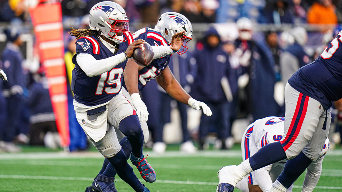 New England Patriots quarterback Joe Milton III (19) looks to pass the ball against the Buffalo Bills in the second half at Gillette Stadium.