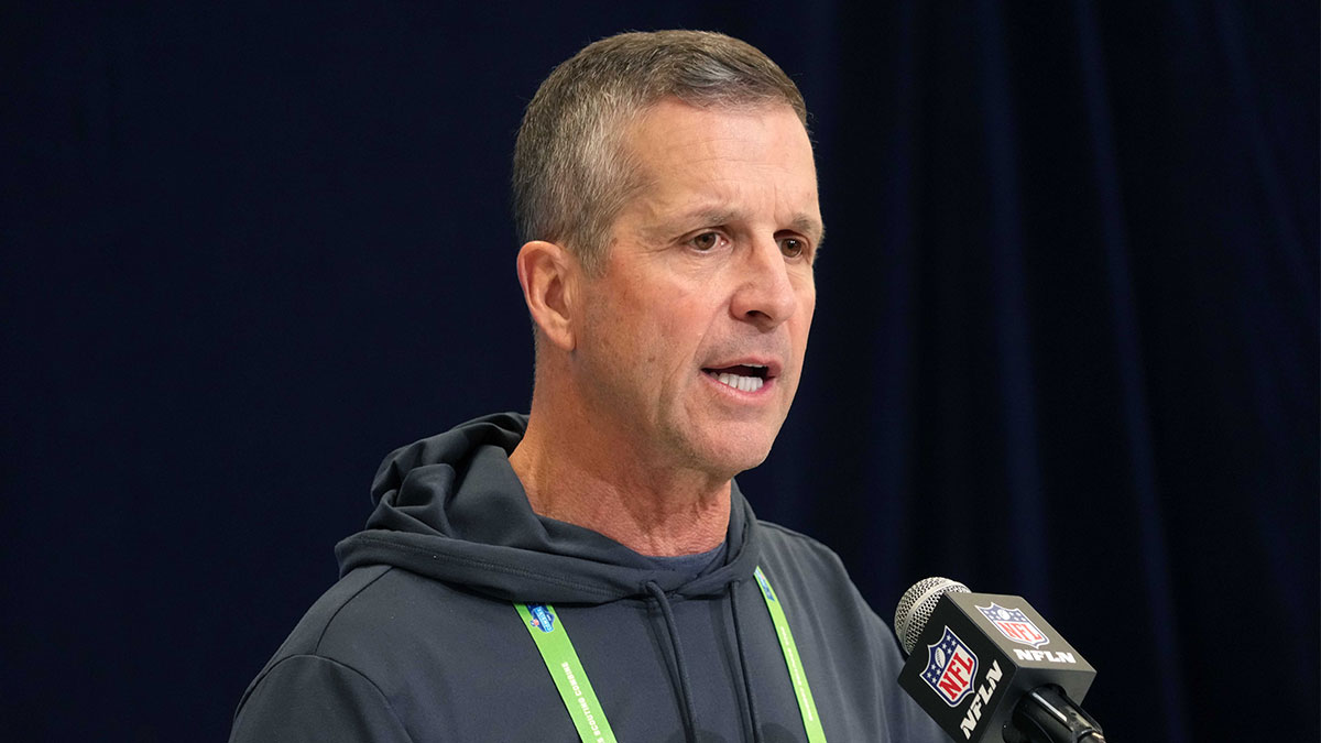 Baltimore Ravens coach John Harbaugh speaks during the NFL Scouting Combine at the Indiana Convention Center.