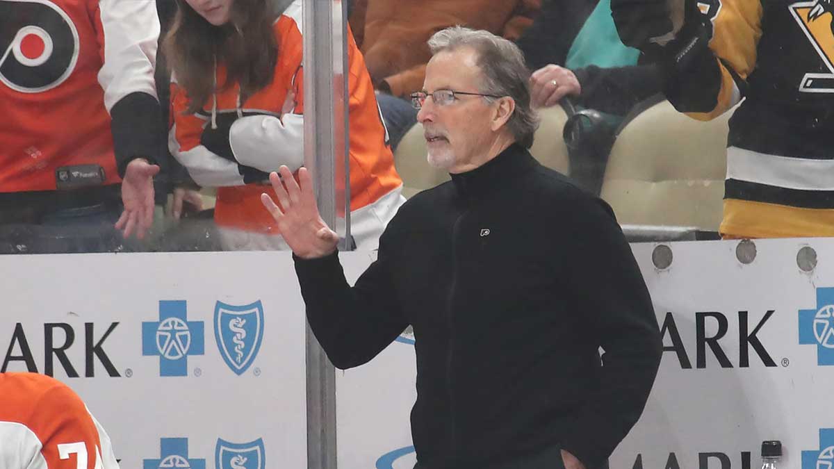 Philadelphia Flyers head coach John Tortorella reacts on the bench against the Pittsburgh Penguins during the second period at PPG Paints Arena.