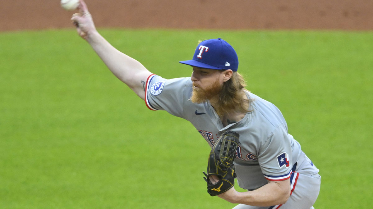 Texas Rangers starting pitcher Jon Gray (22) delivers a pitch in the first inning against the Cleveland Guardians at Progressive Field.