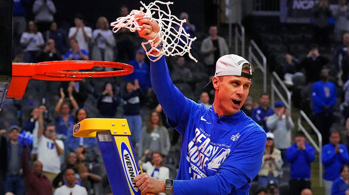 Duke Blue Devils head coach Jon Scheyer cuts down the net after the Duke Blue Devils beat the Alabama Crimson Tide in the East Regional final of the 2025 NCAA tournament at Prudential Center.
