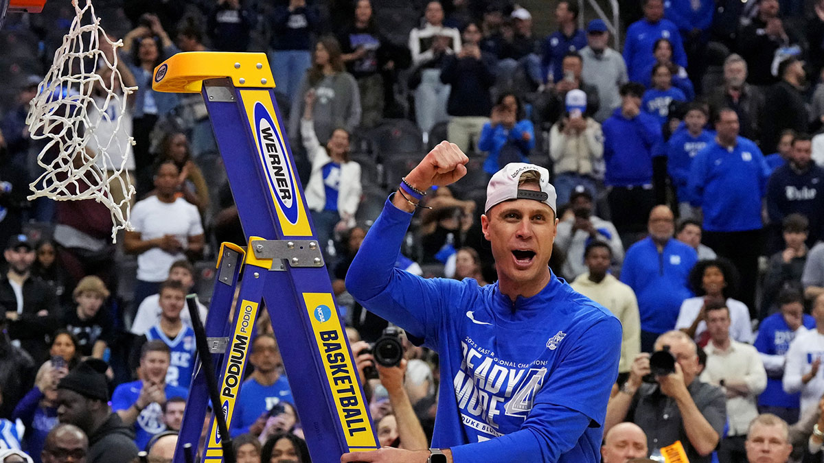 Duke Blue Devils head coach Jon Scheyer cuts down the net after the Duke Blue Devils beat the Alabama Crimson Tide in the East Regional final of the 2025 NCAA tournament at Prudential Center.