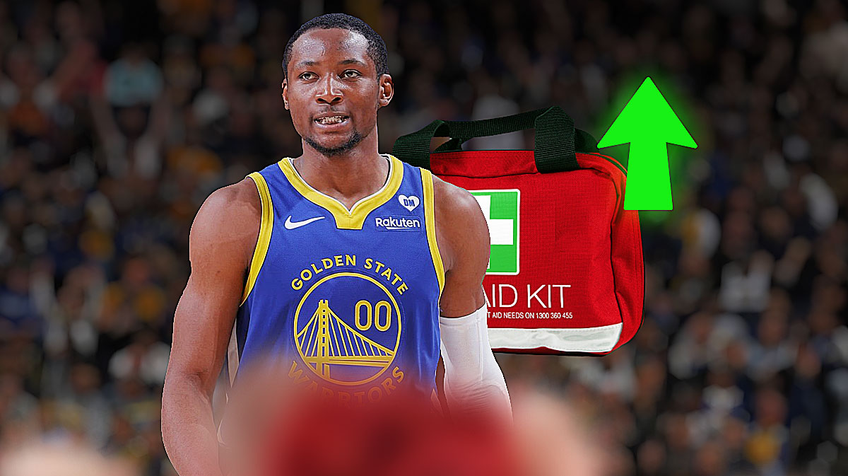 Warriors' Jonathan Kuminga with red medical bag