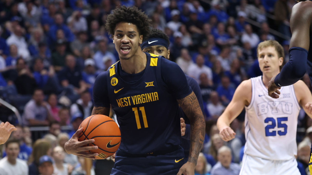 West Virginia Mountaineers guard Jonathan Powell reacts after a rebound against the Brigham Young Cougars during the first half at Marriott Center.
